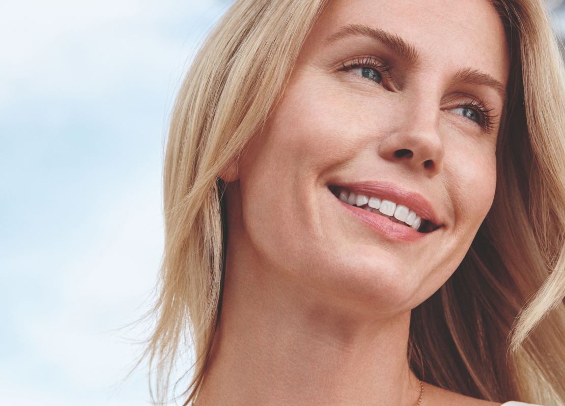 Happy Sculptra® patient smiling 